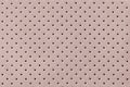 Perforated beige leather texture background, closeup. Light brown backdrop from wrinkle skin Royalty Free Stock Photo