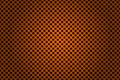 Perforated black and orange metallic background