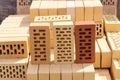 Perforated bricks of different colors with rectangular holes
