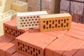 Perforated bricks of different colors and shapes of holes