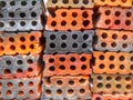 Perforated bricks piles with core holes