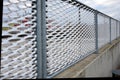 Perforated expanded metal sheet metal fencing. Very durable railing made of galvanized railing frame. The strip of ornamental gras