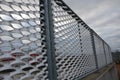 Perforated expanded metal sheet metal fencing. Very durable railing made of galvanized railing frame. The strip of ornamental gras