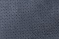 Perforated imitation leather textile texture in black