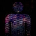 perforated male torso outline in front of a starry night sky and a dark plain backgroÃÂ±und