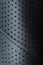 Perforated material made of black imitation leather in full screen Royalty Free Stock Photo