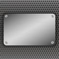 Perforated Metal Background with plate and rivets. Metallic grunge texture. Brushed Steel, aluminum surface template. Royalty Free Stock Photo