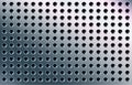 Perforated metal texture, background polished sheet of chrome with round holes. Steel pattern high-tech design processing. Vector Royalty Free Stock Photo