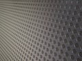 Perforated metallic grid, industrial background