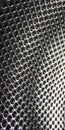 Perforated stainless steel, texture or metallic background Royalty Free Stock Photo