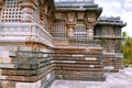 Perforated windows and ornate bas relief, North East wall, Kedareshwara Temple, Halebid, Karnataka.