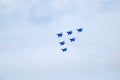 Performance of aerobatic team Russian Knights at the air show..Omsk, Russia - 19 March, 2016: Performance of Russian Knights at