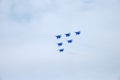 Performance of aerobatic team Russian Knights at the air show..Omsk, Russia - 19 March, 2016: Performance of Russian Knights at