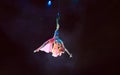 Performance of the girl aerial acrobat in the circus.