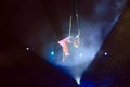 Performance of the girl aerial acrobat in the circus.