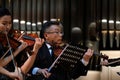 Almaty, Kazakhstan - 11.15.2020 : A group of musicians plays instruments. Performance of symphonic music