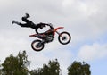 Performance of stunt motorcyclists.