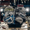 Performance V8 engine on a workbench in a garage or workshop Royalty Free Stock Photo