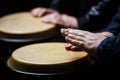 Performers playing bongo drums. Close up of musician hand playing bongos drums. Drum. Hands of a musician playing on Royalty Free Stock Photo