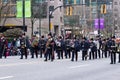 Performers are walking Down the street with Brass Instruments during The Annual Santa Claus Parade Royalty Free Stock Photo