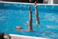 Performing Artistic Duet in Swimming Pool: Synchronized Swimming during Exercise