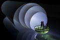 Perfume bottle on the background of a spiral luminous roll. Idea