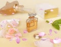 Perfume bottle collection  yellow with flowers petal on white background Royalty Free Stock Photo