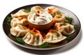 A plate of steaming hot dumplings( manty)