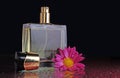 Perfume bottle with a flower