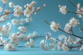 perfume bottle on flower with white blossoms and blue background