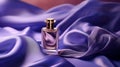 perfume bottle on a folded purple silk fabric - product photo mockup