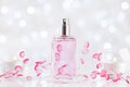 Perfume bottle from glass with fresh fragrance on white table. Beauty and perfumery background. Royalty Free Stock Photo