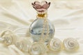 Perfume bottle and pearls