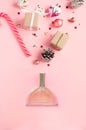 Perfume bottle on pink background. Flat lay Royalty Free Stock Photo