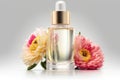 Perfume bottle with pink and white gerbera flowers on grey background Royalty Free Stock Photo