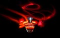 Perfume bottle and red light painting