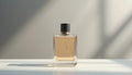 Still life of a perfume bottle with light and shadow on a neutral background in a studio setting Royalty Free Stock Photo