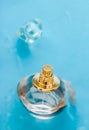 Perfume bottle under blue water, fresh sea coastal scent as glamour fragrance and eau de parfum product as holiday gift, luxury Royalty Free Stock Photo