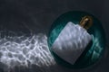 Perfume bottle under water Royalty Free Stock Photo