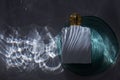 Perfume bottle under water with bubbles. Royalty Free Stock Photo