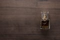 Perfume bottle on the wooden table