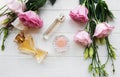 Perfume bottles with flowers Royalty Free Stock Photo