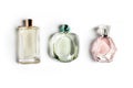 Perfume bottles on light background. Perfumery, cosmetics, fragrance collection.