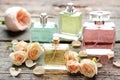 Perfume bottles with roses Royalty Free Stock Photo