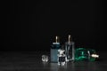 Perfume bottles on table black background Royalty Free Stock Photo