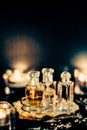 Perfume bottles and vintage fragrance at night, aroma scent, fragrant cosmetics and eau de toilette as luxury beauty brand, Royalty Free Stock Photo