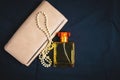 Perfume bottles and women handbags with beautiful jewelry