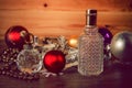 Perfume and Christmas decorations Royalty Free Stock Photo