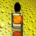 Perfume Giorgio Armani Si on the background of drops