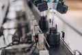 Perfume machinery manufacturing and filling bottles in a factory